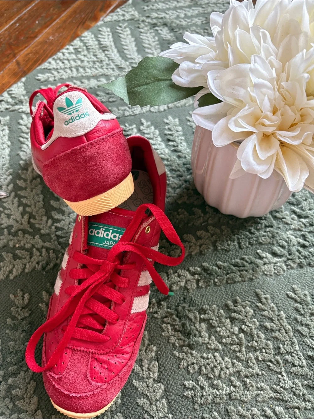 adidas women’s Red Sneakers with White Stripes